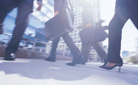Close Up of Business People's Feet While Walking