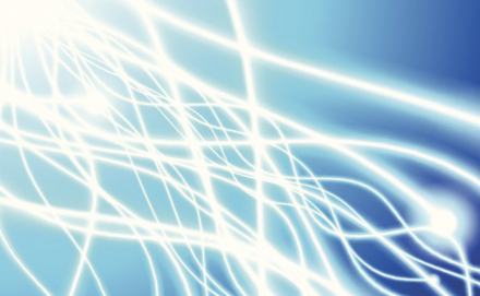 Abstract image of white squiggling lights on a blue background
