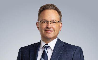 Portrait of Eric Kalnins, TEP, J.D., LL.M.